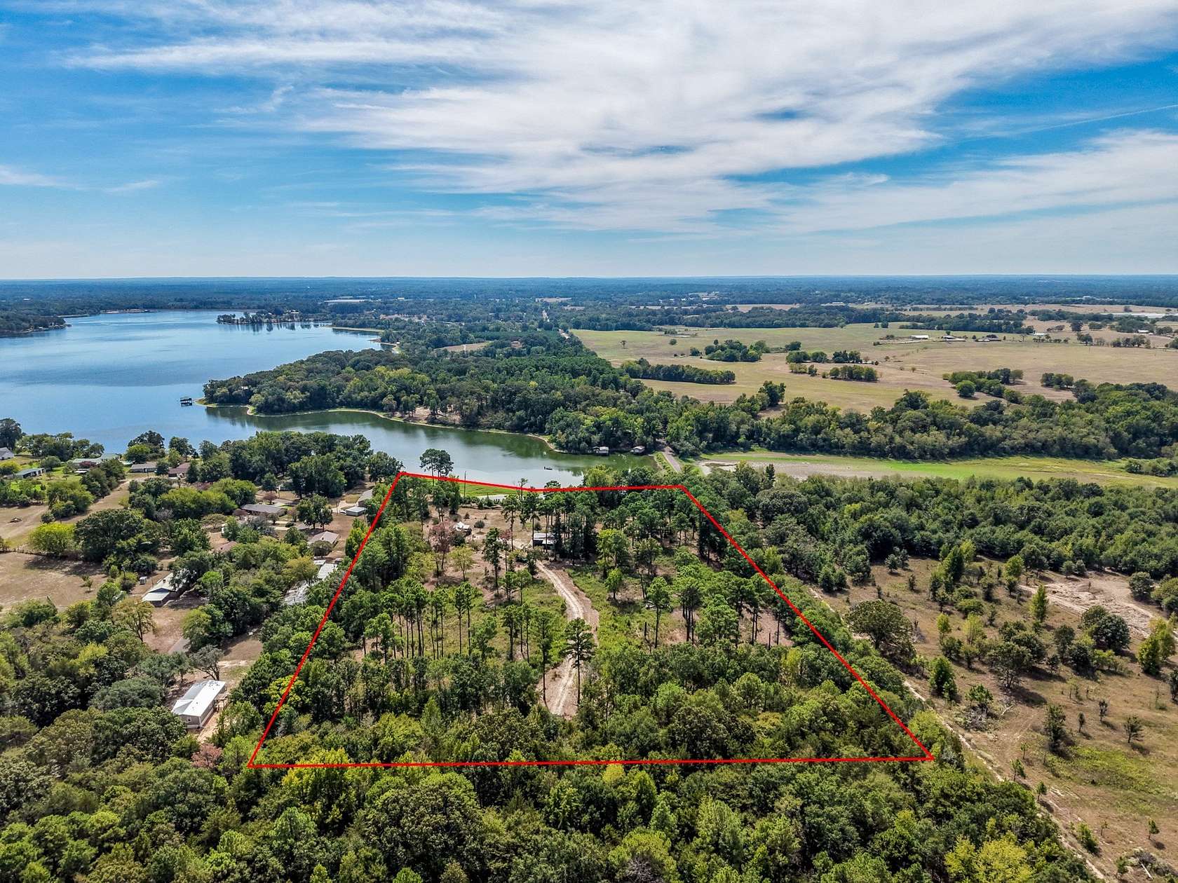 9.86 Acres of Land with Home for Sale in Winnsboro, Texas