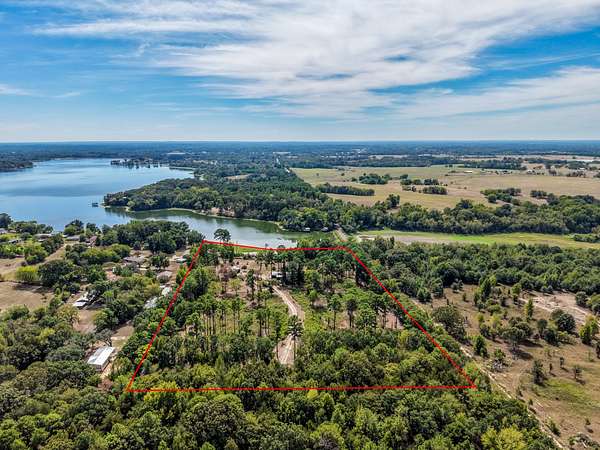 9.86 Acres of Land with Home for Sale in Winnsboro, Texas