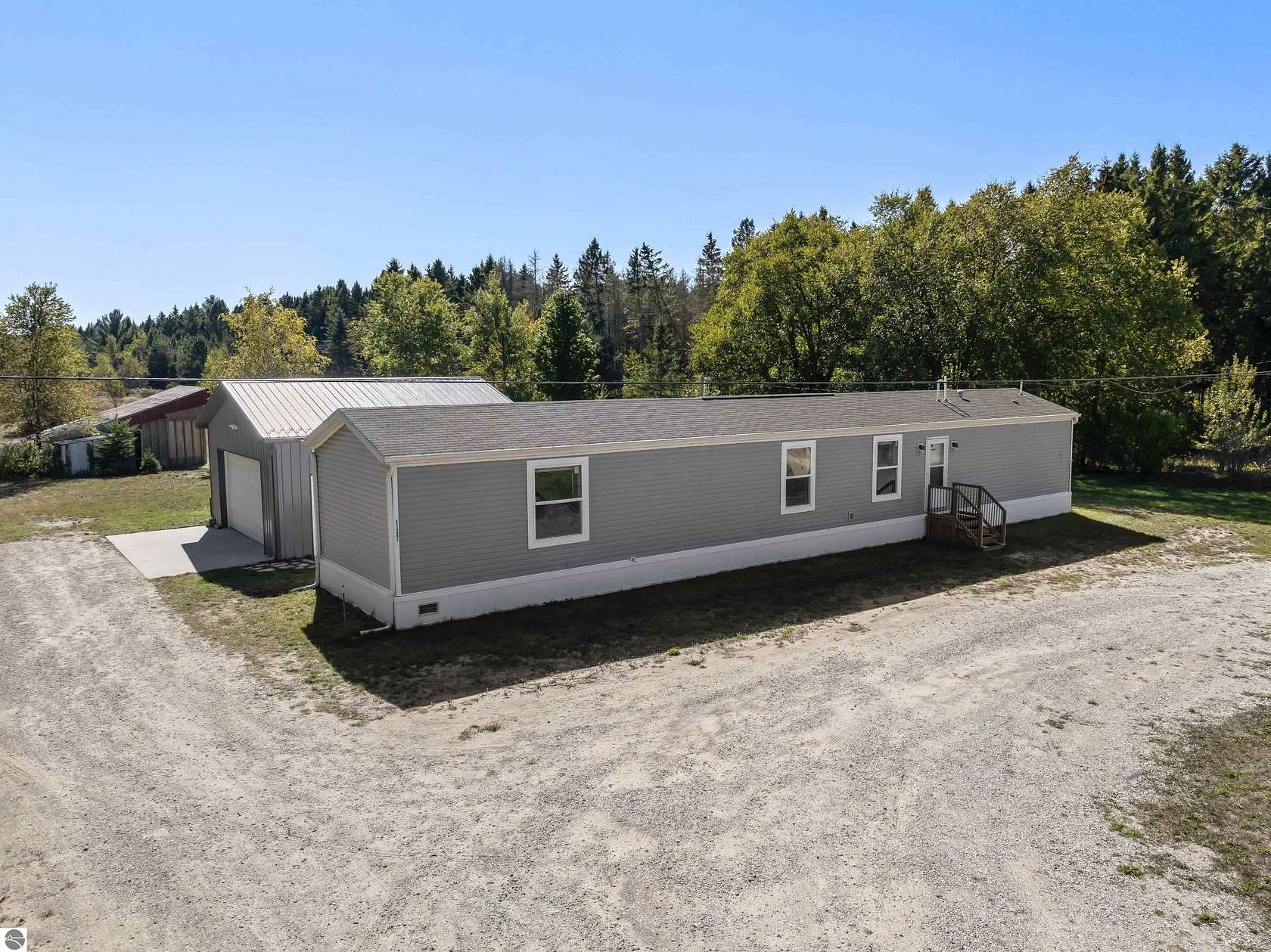 5 Acres of Land with Home for Sale in Beulah, Michigan