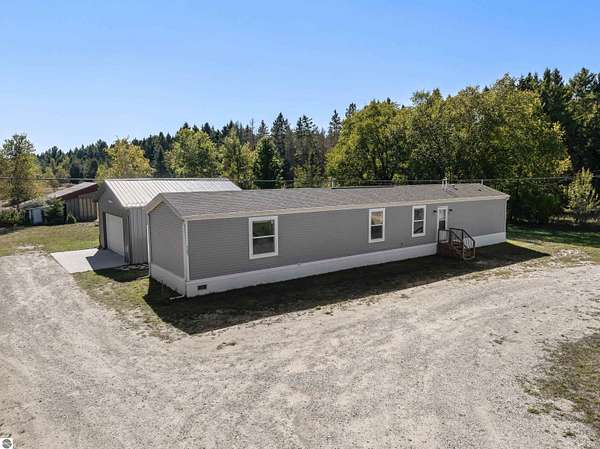 5 Acres of Land with Home for Sale in Beulah, Michigan