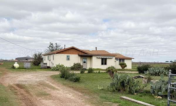 5 Acres of Land with Home for Auction in Canyon, Texas