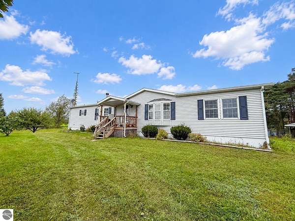 9.16 Acres of Land with Home for Sale in Lake City, Michigan