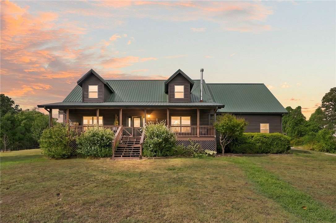 5 Acres of Land with Home for Sale in Gravette, Arkansas