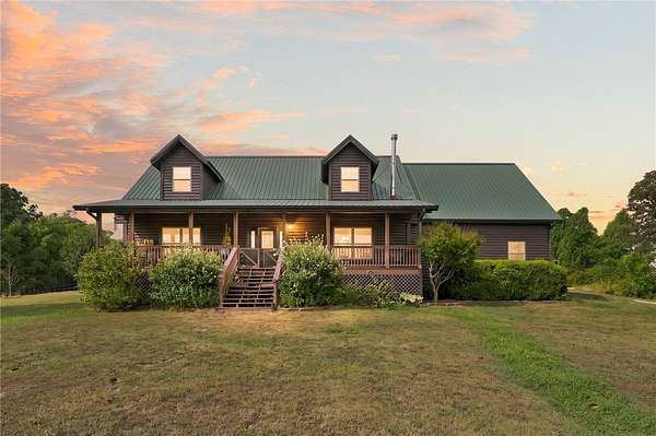 5 Acres of Land with Home for Sale in Gravette, Arkansas