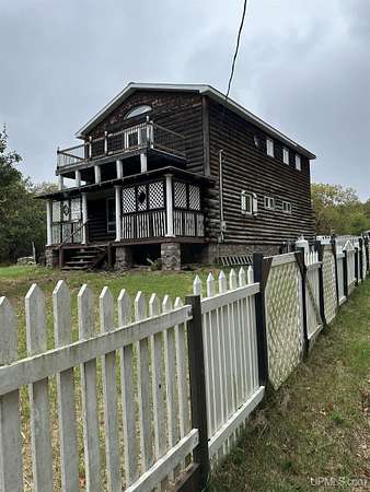 15.8 Acres of Land with Home for Sale in Iron River, Michigan