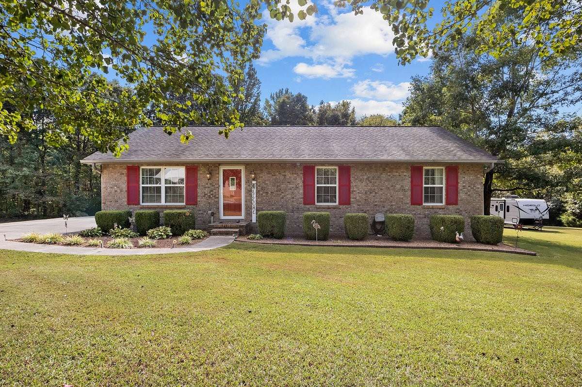 1.69 Acres of Land with Home for Sale in New Johnsonville, Tennessee