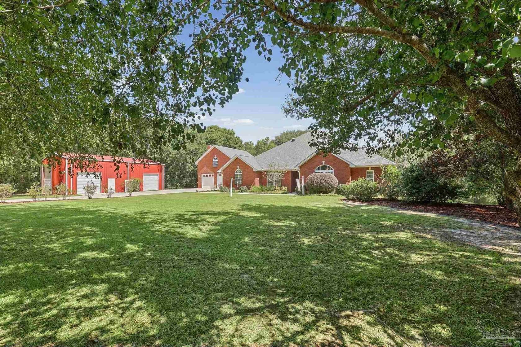 4.29 Acres of Land with Home for Sale in Pace, Florida
