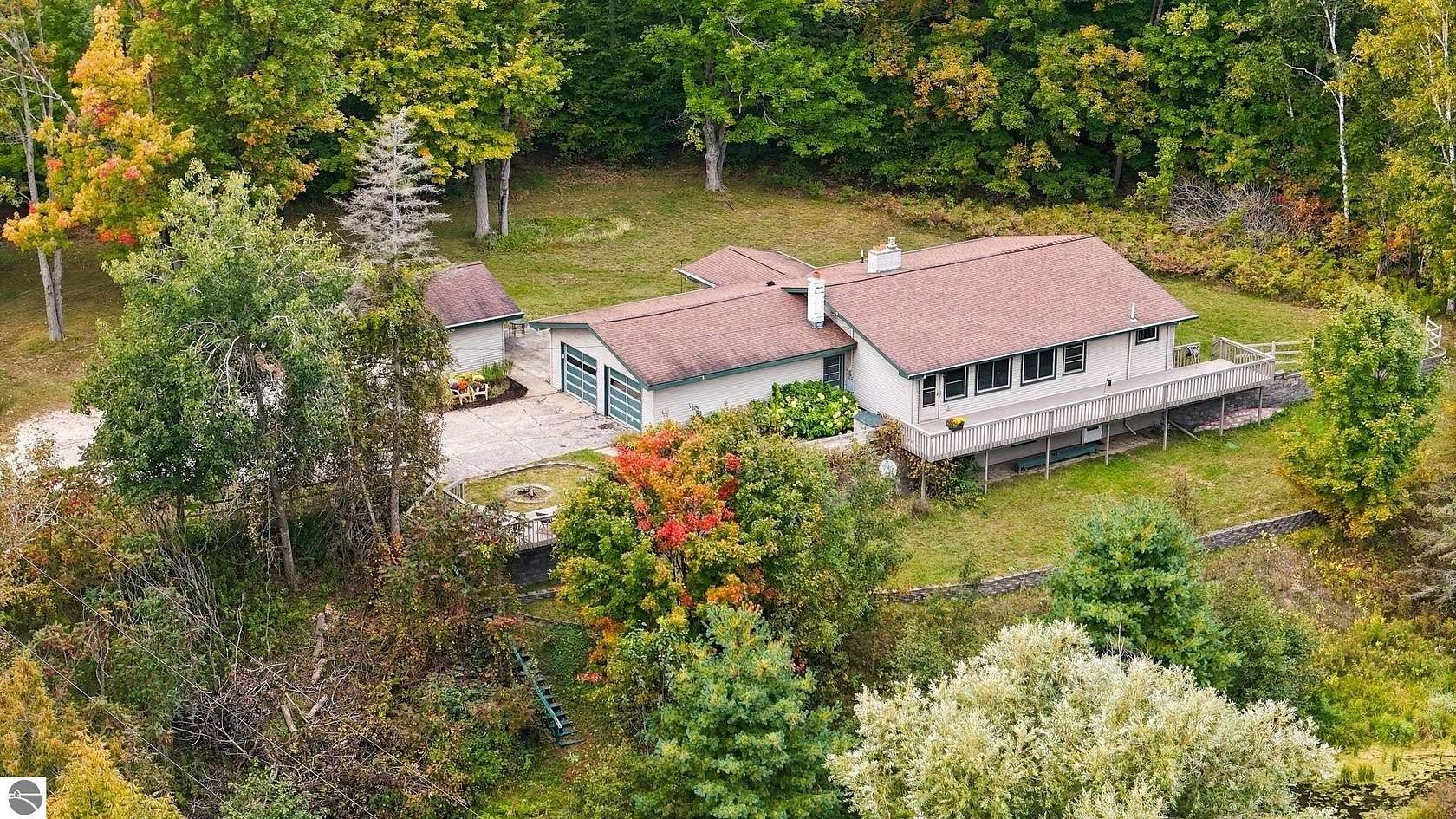 23 Acres of Recreational Land with Home for Sale in Lake City, Michigan