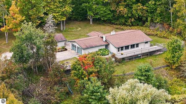 23 Acres of Recreational Land with Home for Sale in Lake City, Michigan