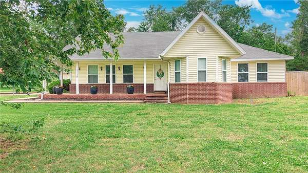 2.5 Acres of Land with Home for Sale in Cave Springs, Arkansas