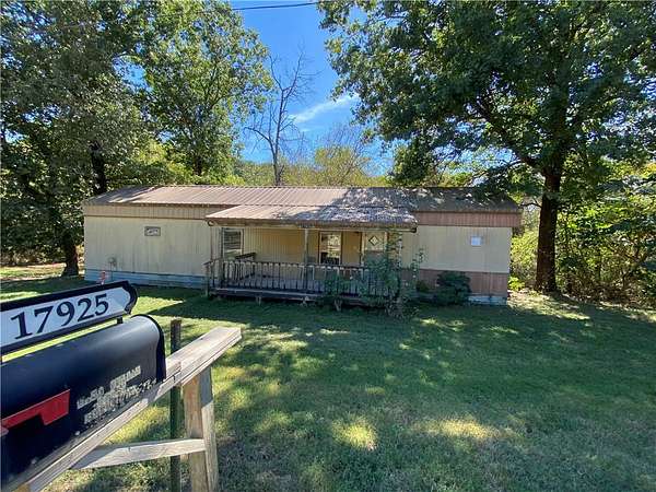 4 Acres of Land with Home for Sale in Elkins, Arkansas