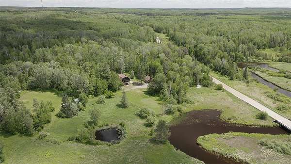70 Acres of Recreational Land with Home for Sale in Angora, Minnesota