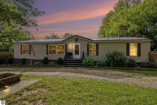 5.3 Acres of Land with Home for Sale in Sumner, Michigan