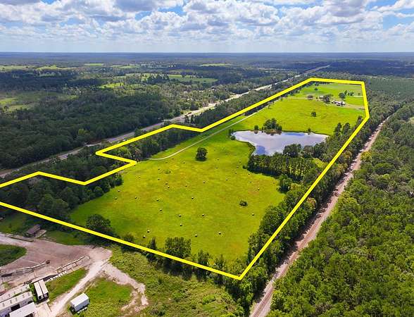 78.7 Acres of Recreational Land with Home for Sale in Moscow, Texas