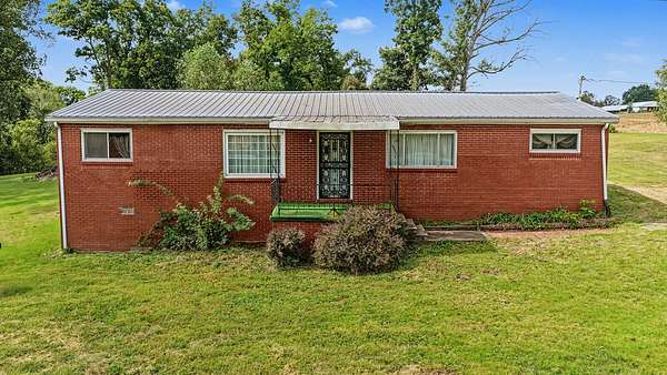 2.38 Acres of Land with Home for Auction in Gracey, Kentucky
