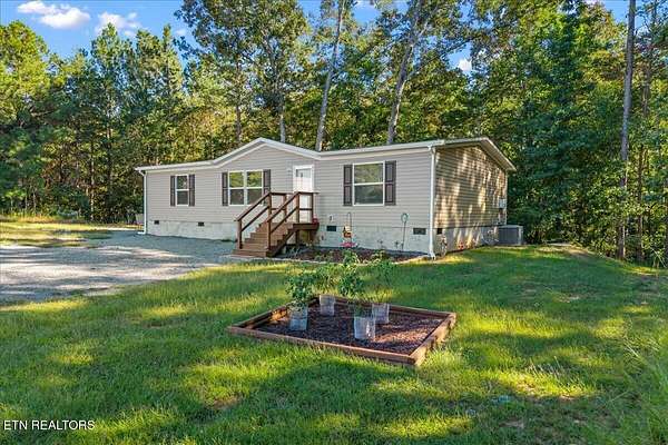5 Acres of Land with Home for Sale in Benton, Tennessee