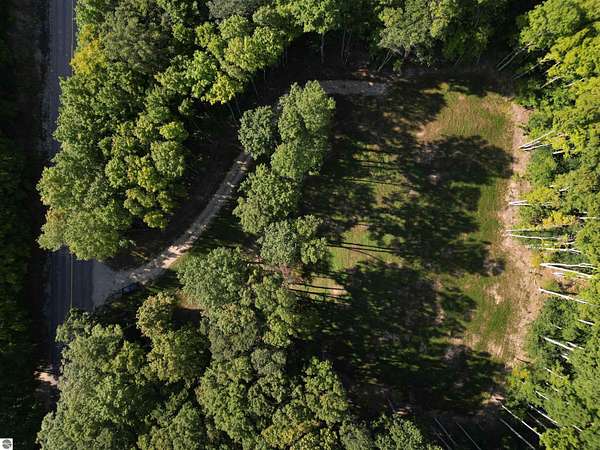 5 Acres of Residential Land for Sale in Maple City, Michigan