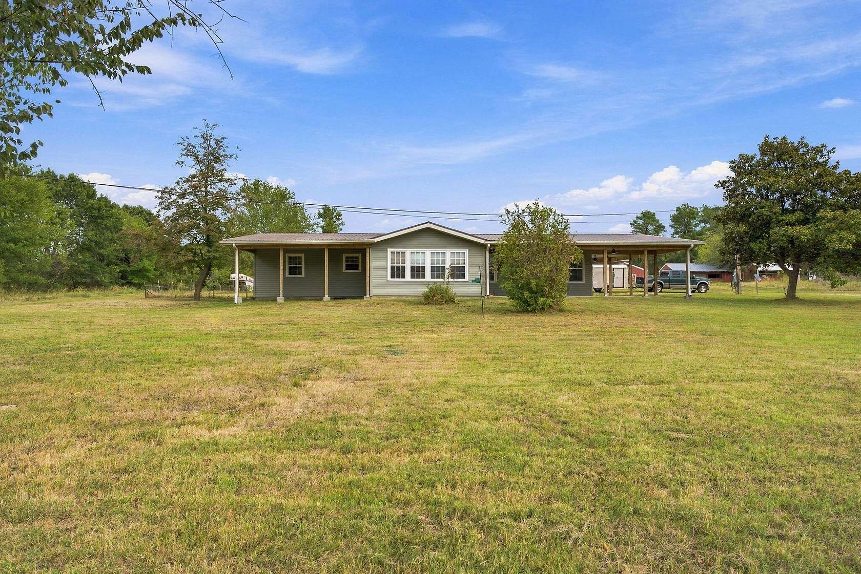 6.6 Acres of Land with Home for Sale in Aurora, Missouri
