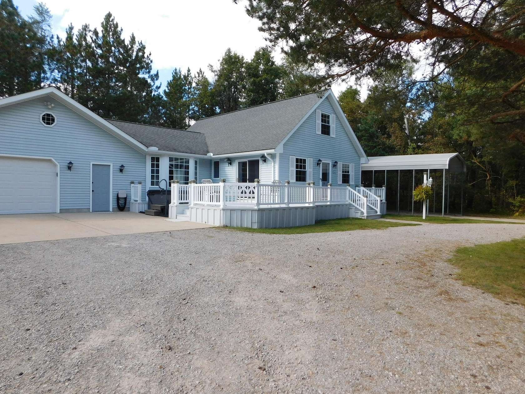 5 Acres of Land with Home for Sale in Grayling, Michigan