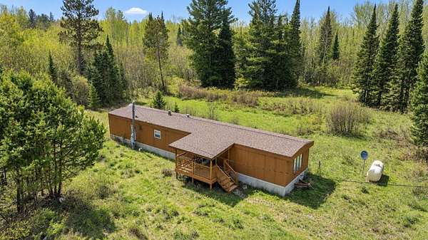 55.3 Acres of Recreational Land with Home for Sale in Luzerne, Michigan