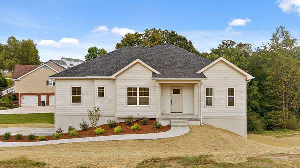 1.64 Acres of Land with Home for Sale in Soddy-Daisy, Tennessee
