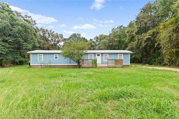 1.63 Acres of Land with Home for Sale in Wilmer, Alabama