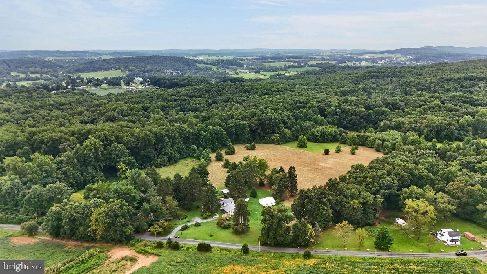 14 Acres of Land with Home for Auction in Elverson, Pennsylvania