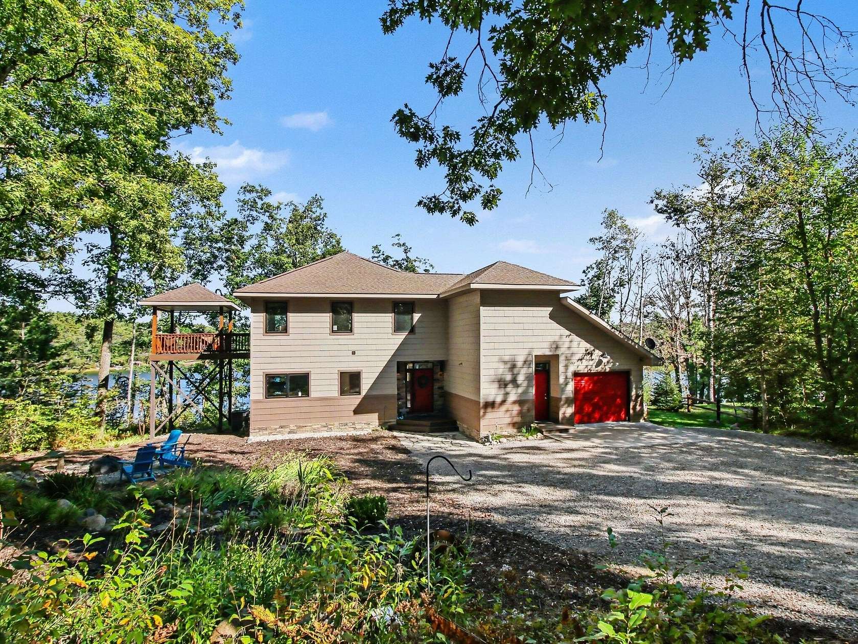 13.1 Acres of Recreational Land with Home for Sale in Comins, Michigan