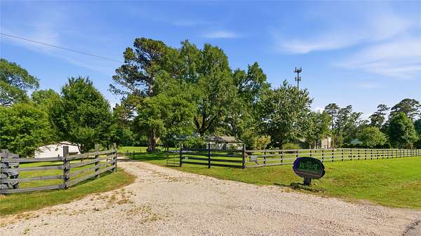 9 Acres of Land with Home for Sale in Willis, Texas