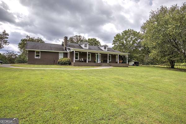 5.49 Acres of Land with Home for Sale in Silver Creek, Georgia