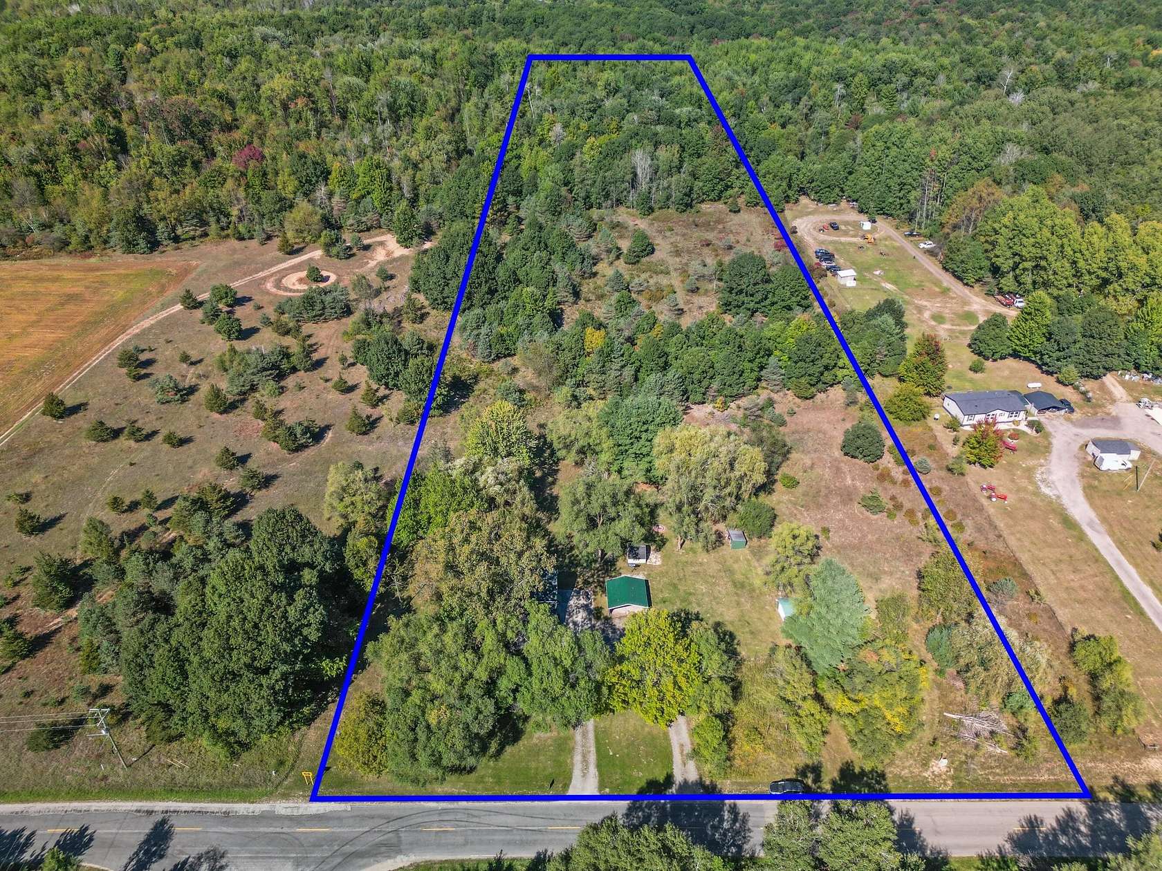 11.6 Acres of Land with Home for Sale in Grant, Michigan