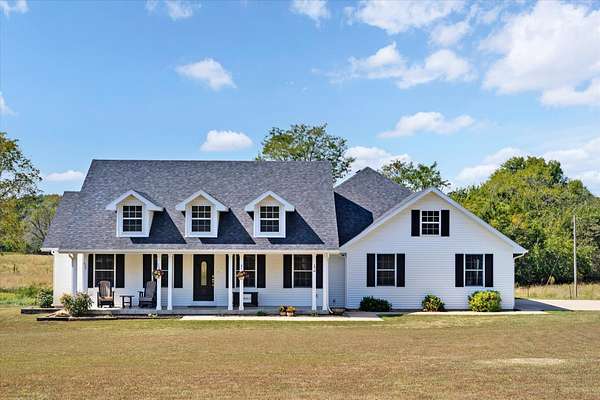 60 Acres of Recreational Land with Home for Sale in Dunnegan, Missouri