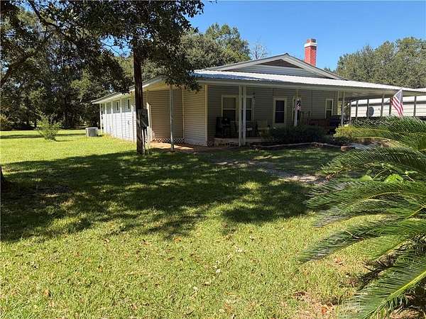 1.65 Acres of Land with Home for Sale in Grand Bay, Alabama
