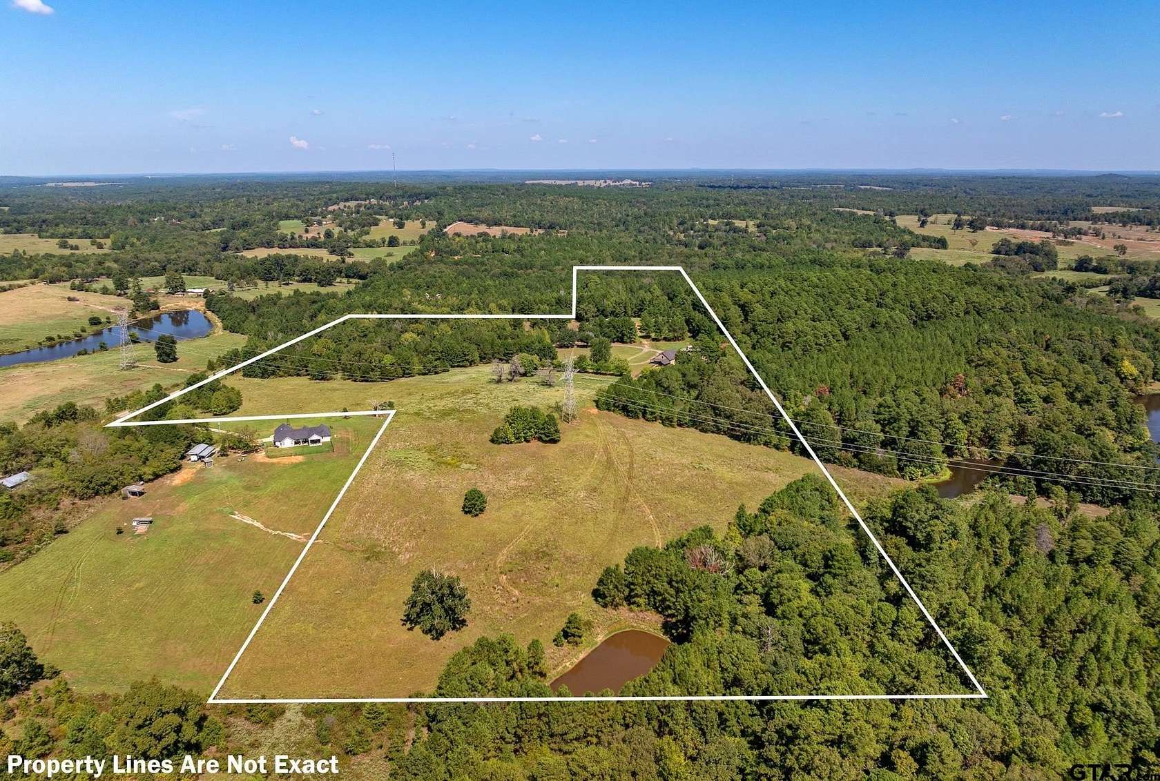 41.8 Acres of Agricultural Land with Home for Sale in Tyler, Texas