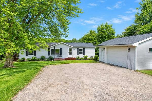 5 Acres of Land with Home for Sale in Delton, Michigan