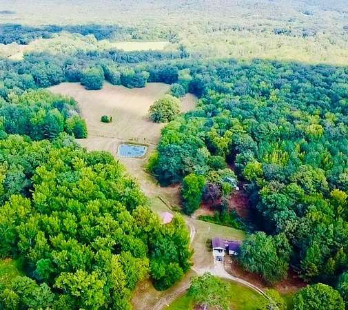 33 Acres of Land with Home for Sale in Winfield, Alabama