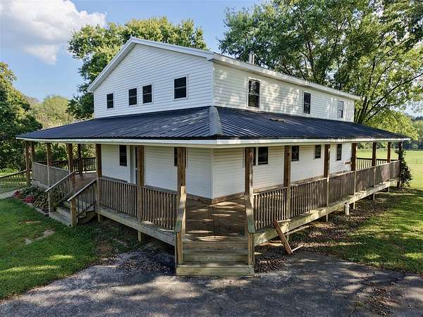 16.2 Acres of Land with Home for Auction in Summer Shade, Kentucky