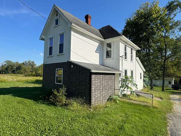 6 Acres of Land with Home for Auction in Richmond, Indiana