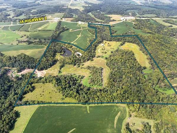 174 Acres of Recreational Land with Home for Sale in Durango, Iowa