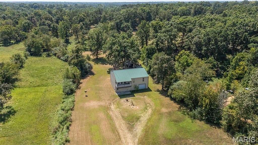 7 Acres of Land with Home for Sale in Poplar Bluff, Missouri