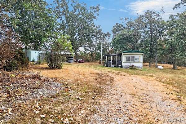 12.5 Acres of Land with Home for Sale in Phillipsburg, Missouri