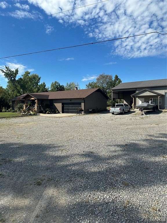 2.9 Acres of Land with Home for Sale in Poplar Bluff, Missouri