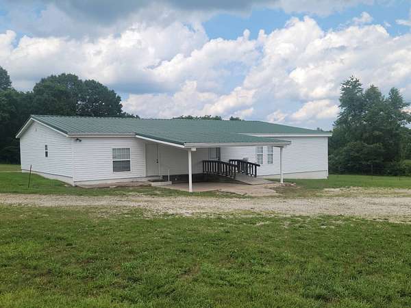 1.6 Acres of Improved Commercial Land for Sale in Ash Flat, Arkansas