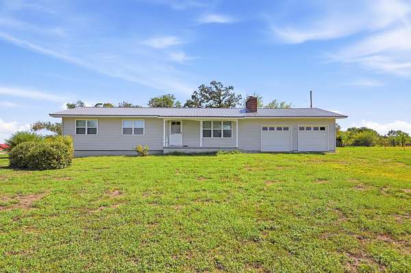 75.1 Acres of Land with Home for Sale in Stark City, Missouri