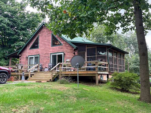 13.2 Acres of Land with Home for Auction in Beaver Springs, Pennsylvania