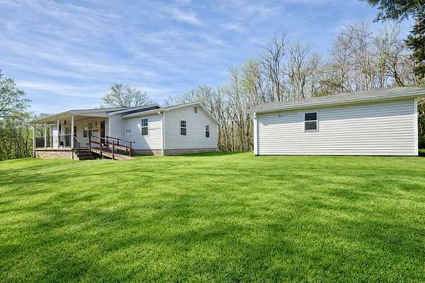 22.8 Acres of Recreational Land with Home for Sale in Clifton, Tennessee