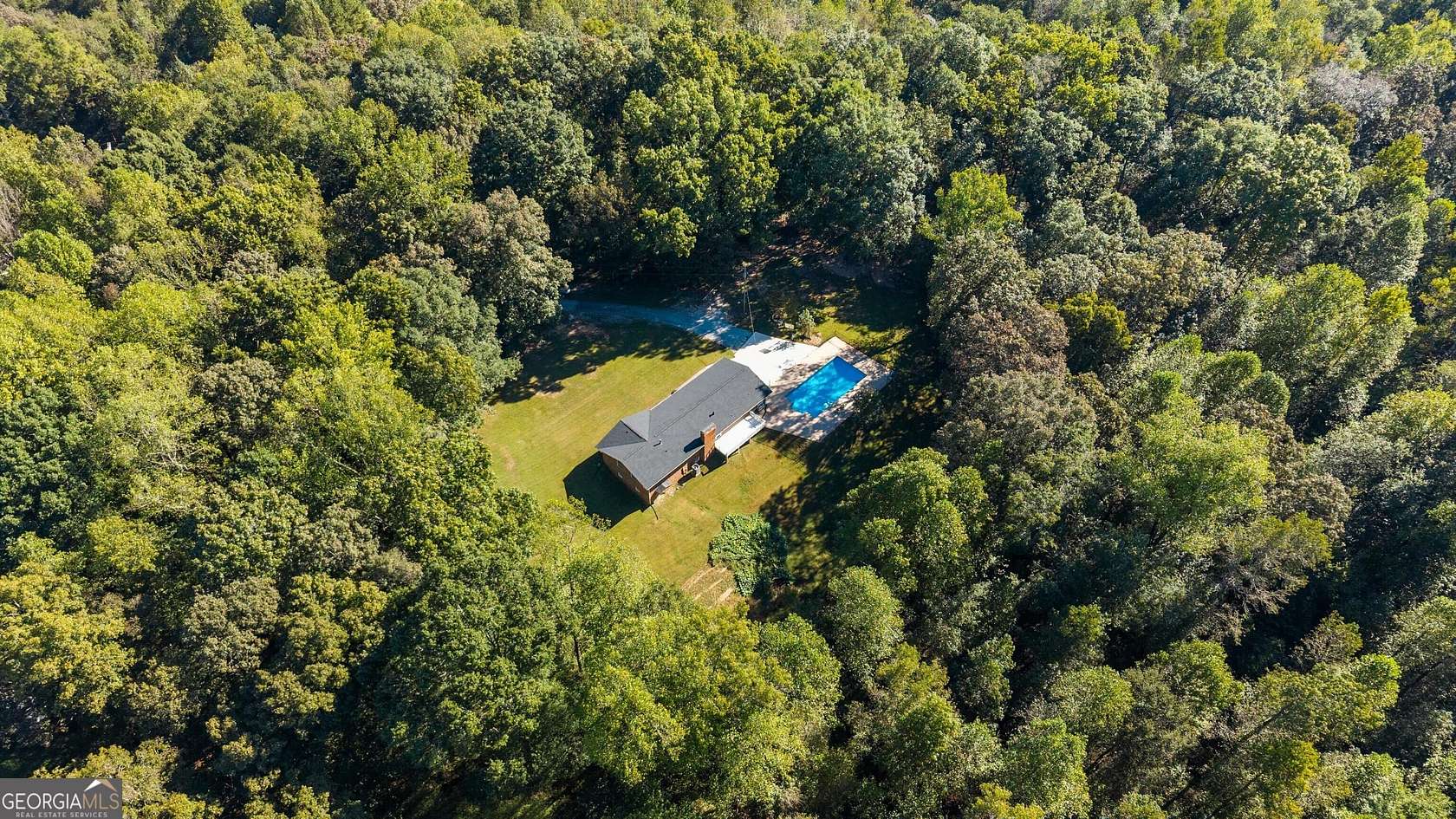 7.68 Acres of Land with Home for Sale in Bowdon, Georgia