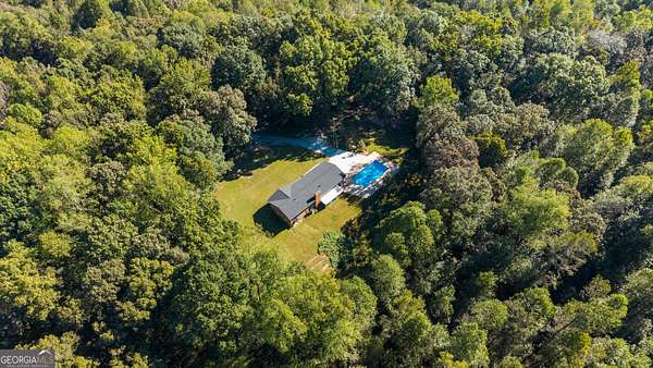 7.68 Acres of Land with Home for Sale in Bowdon, Georgia