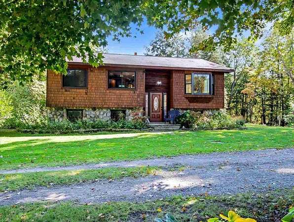 12.5 Acres of Recreational Land with Home for Sale in Boyne City, Michigan