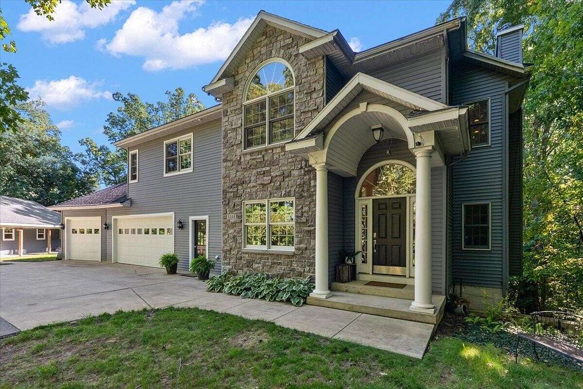 2 Acres of Land with Home for Sale in Jenison, Michigan